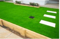 Artificial turf is very easy to landscape around.